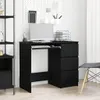 A black wooden desk with a computer and keyboard on it, set in a home office environment. Produktbild-Vorschau