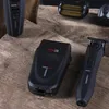 A collection of BaByliss PRO hair clippers and shavers are displayed on a rustic wooden surface. Anteprima dell’immagine prodotto