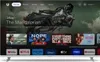 A smart TV screen displaying a streaming service interface with various movie and app options. Náhled obrázku produktu