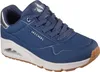 A single blue Skechers sneaker shown from a side-diagonal angle against a white background. Podgląd zdjęcia produktu