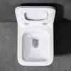A top-down view of a white ceramic toilet bowl with the lid open, set against a grey tiled floor. Produktbild-Vorschau