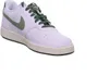 A white Nike Court Vision Low sneaker with green accents and laces, shown from a side angle on a white background. Produktbild-Vorschau