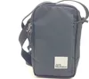 A close-up studio shot of a gray Jack Wolfskin crossbody bag against a white background. Náhľad obrázku produktu
