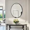 A hallway with a console table and a mirror. Produktbild-Vorschau