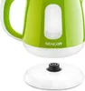 A close-up shot of a green and white electric kettle base with its power cord resting on a white surface. Náhled obrázku produktu