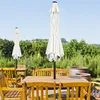 An outdoor patio scene with wooden furniture and umbrellas. Produktbild-Vorschau