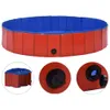 A foldable dog pool with red exterior walls and a blue interior. It is shown in a circular shape, and also folded in a smaller inset image. Close-ups of the drain valve are also shown. Náhľad obrázku produktu