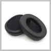 Two black ear pads for headphones are shown on a white background. Produktbild-Vorschau