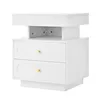A white nightstand with two drawers and an open shelf above. Podgląd zdjęcia produktu