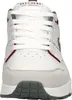 A close-up, front-facing view of a white sneaker with gray and red accents. Voir les images du produit