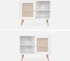 Two images of a white sideboard with a rattan woven door and wooden legs, presented against a neutral background. Anteprima dell’immagine prodotto