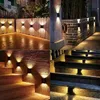 Collage of outdoor lighting fixtures installed in various settings. Náhľad obrázku produktu