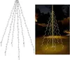A diagram of a light curtain and a lit light curtain tree in a garden at night. Náhled obrázku produktu