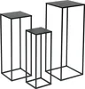 Three black metal plant stands of varying heights are arranged on a white background. Anteprima dell’immagine prodotto