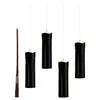A wand and four black LED candles are displayed against a white background. Produktbild-Vorschau