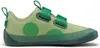 A single green children's shoe with polka dots, shown from the side. Produktbild-Vorschau