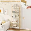 A tall, five-tier ladder shelf unit with a gold metal frame and white shelves, decorated with various items, is placed next to a white sofa and a closed door in a living room setting. An inset image shows a close-up of the shelf's mounting hardware. Produktbild-Vorschau