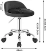 A product image showing a dark gray office stool with dimensions indicated by text and arrows. Produktbild-Vorschau
