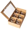 A set of six clear glass Christmas ornaments filled with shredded brown paper, presented in a cardboard box with a clear plastic window. Podgląd zdjęcia produktu