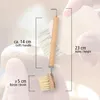 A close-up shot of a brush with measurement indicators and text. Produktbild-Vorschau