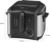 A black and silver deep fryer with dimensions indicated. Náhled obrázku produktu