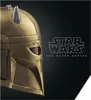 A close-up of a golden Mandalorian helmet with silver accents, set against a black background with the Star Wars The Black Series logo. Anteprima dell’immagine prodotto