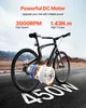 A black electric bicycle with a visible motor, set against a road and mountainous background. Produktbild-Vorschau