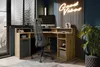 A modern home office setup with a corner desk, computer, and chair, decorated with a neon sign and plants. Produktbild-Vorschau