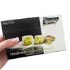 Hand hält Kandylas Loukoumi mit Pistazien 200 g Packung Produktbild-Vorschau