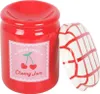 A red ceramic jar with a checkered lid, designed to look like a jam jar. Voir les images du produit