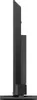 Side view of a black television on a stand. Podgląd zdjęcia produktu