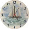 A clock with a sailing ship painted on it. Produktbild-Vorschau