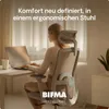 A woman is working on a laptop while sitting in an ergonomic office chair in a well-lit room. Podgląd zdjęcia produktu