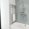 A bathroom scene with a bathtub, shower, and a towel rack with a towel. Produktbild-Vorschau