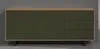A sideboard with green textured doors and drawers on a gray background. Podgląd zdjęcia produktu