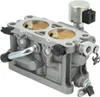 A close-up studio shot of a carburetor. Voir les images du produit