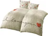 A bedding set with a heart pattern and the text 'I love you'. Produktbild-Vorschau