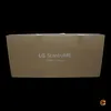A cardboard box with product branding on a black background. Voir les images du produit