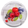 A circular image featuring a collection of fresh berries and leaves arranged on a light wooden background. Voir les images du produit