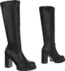 A pair of black leather-look knee-high boots with chunky heels and platform soles are displayed against a white background. The boots are shown from two different angles, one full boot and one showing the side with a zipper. Produktbild-Vorschau