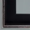 A close-up view of a picture frame corner. Produktbild-Vorschau