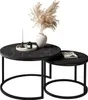 Two nesting coffee tables with a vase of dried pampas grass, a candle, and a book on them. Náhľad obrázku produktu
