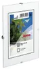 A white frameless picture holder with a tropical beach scene displayed inside. Produktbild-Vorschau