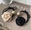 Rosa Frottee-Haargummi mit Rose Produktbild-Vorschau 1