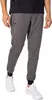 A person wearing Under Armour jogger pants and white sneakers, shown from the waist down against a white background. Produktbild-Vorschau