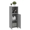 A tall, narrow gray cabinet with a plant on top and various items inside. Produktbild-Vorschau
