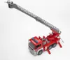 A toy fire engine with a raised ladder, photographed against a white background. Náhled obrázku produktu