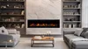 A modern living room with a fireplace, sofas, and bookshelves. Podgląd zdjęcia produktu