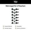 A black wine rack holding six green wine bottles against a white background. Produktbild-Vorschau