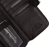 A close-up view of the interior of a black leather wallet, showing card slots and embossed branding. Produktbild-Vorschau